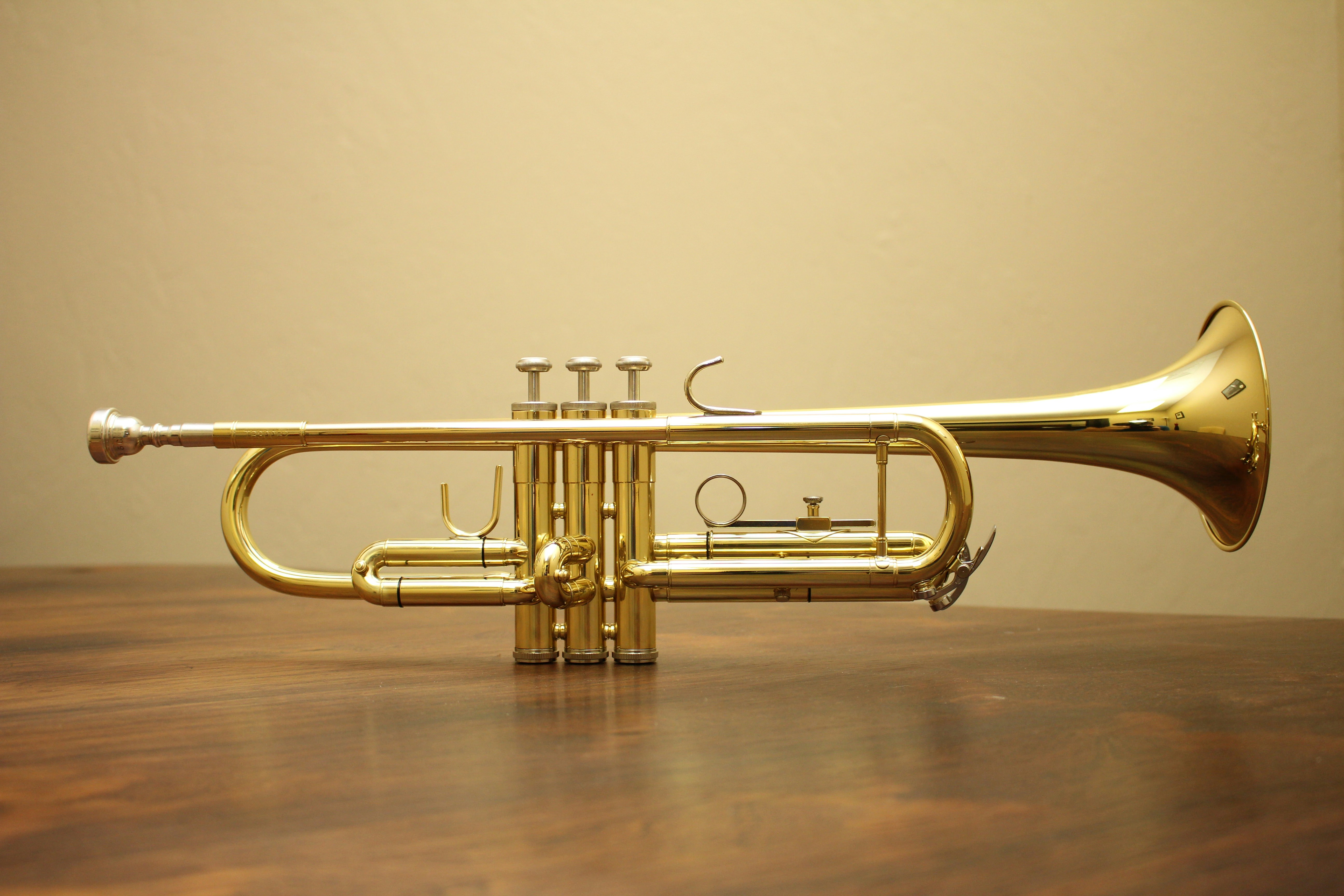 brass-colored trumpet